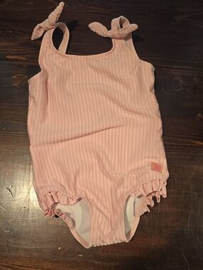 ​RuffleButts Pink Seersucker One-Piece Swimsuit with Shoulder Ties – 4T
